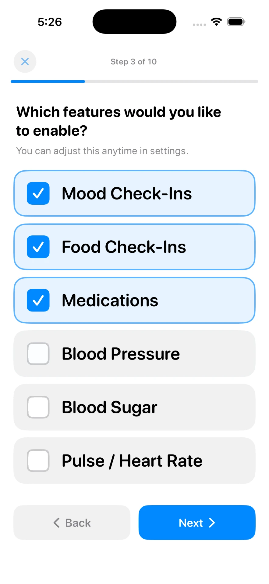 Setup step asking which features to enable, with mood, food, medications, blood pressure, blood sugar and heart rate