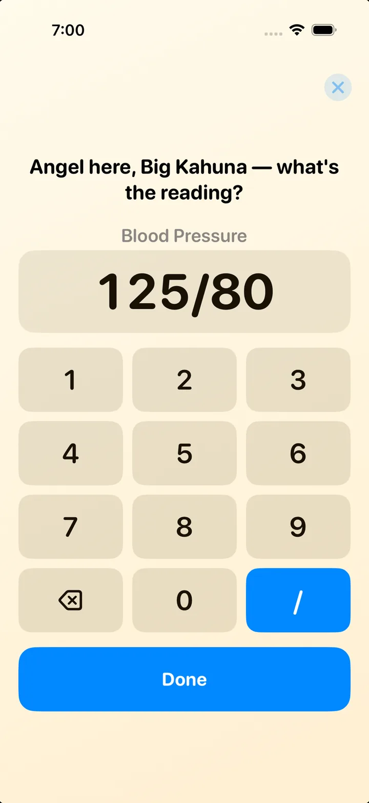 Blood pressure check-in with a large keypad showing a 125/80 reading and a slash key